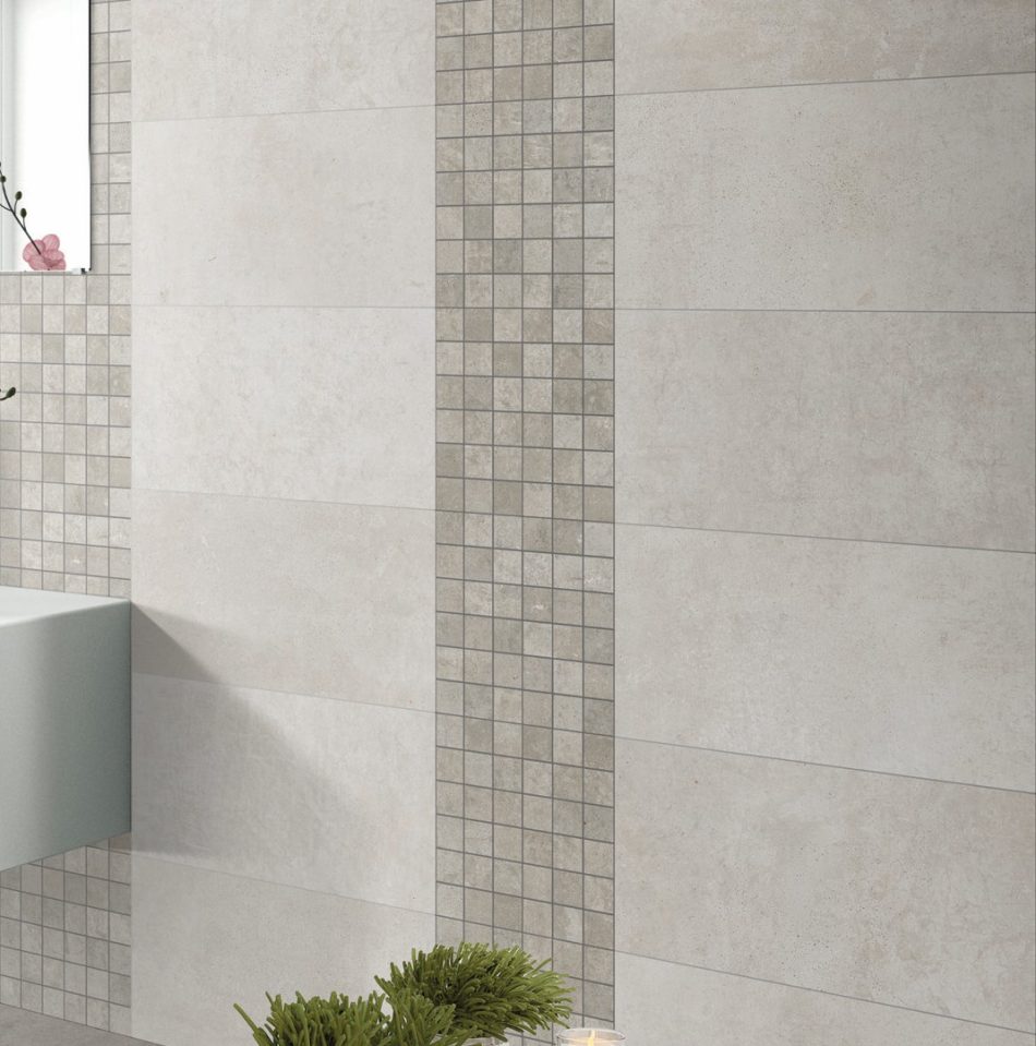 Atelier Lux Grey: 24x48 concrete look tile in on a bathroom wall