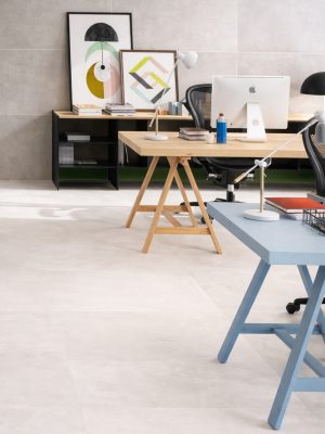 Atelier Lux: White and Grey 24x48 concrete look tile in a commercila space