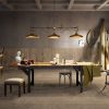a dining room with a large wood look tile that has raw finish in tone of beige
