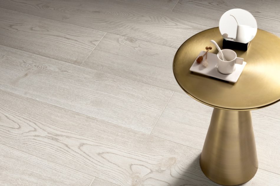 Close-up image showing the honey-white color and raw finish of White Laurel tile