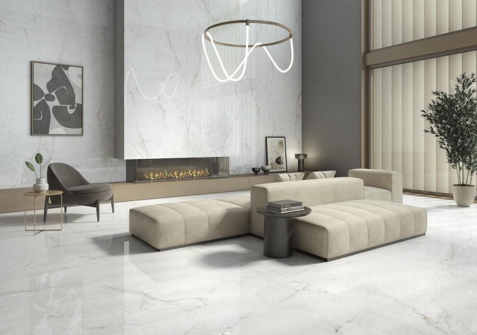 picture showing a white marble style 63x63 inch tile on a living room floor and the accent wall