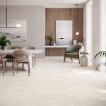 spacious living room with extra large porcelain tile in light beige color that doesn't have too much variation