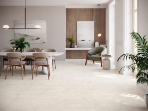 spacious living room with extra large porcelain tile in light beige color that doesn't have too much variation