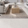 Soft Cement White white concrete-look porcelain tile in a living room
