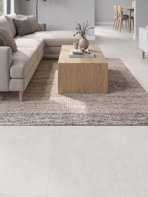 Soft Cement White white concrete-look porcelain tile in a living room