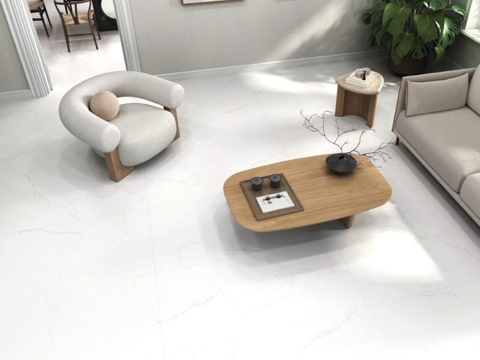 A modern living room with a 48×48 matte marble look porcelain tile