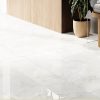 large format white tile with a luxurious polished finish that looks like a vein free marble look tile