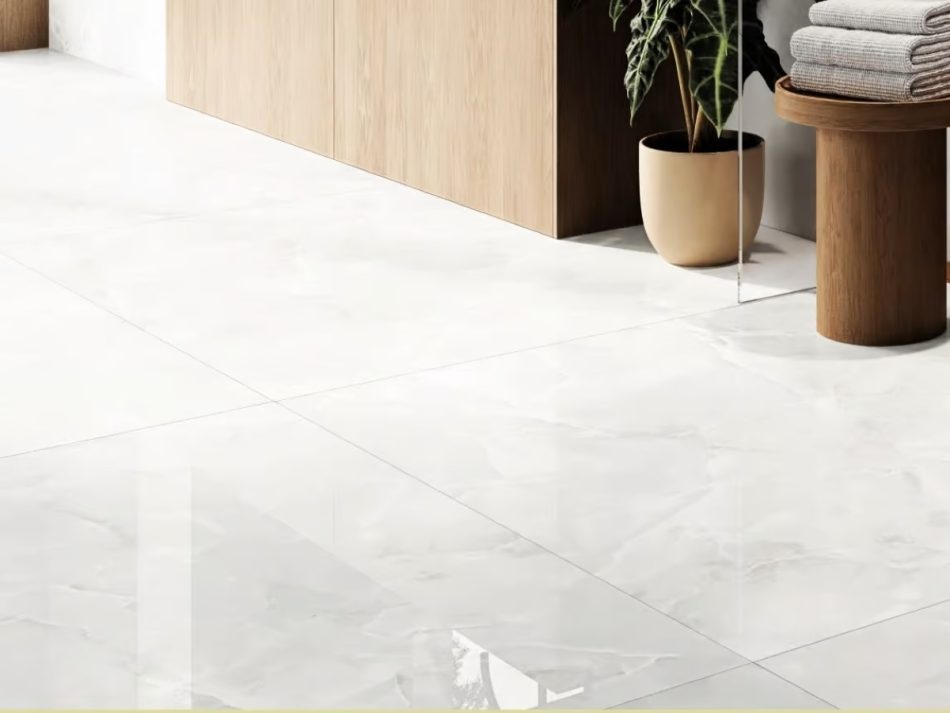large format white tile with a luxurious polished finish that looks like a vein free marble look tile