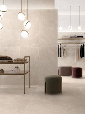 Stone look tile 24x48 tune ivory on as wall tile in a high-end boutique