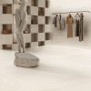 Navoana White Travertine Look tile with veincut and the crosscut design in honed finish