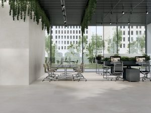 large format 48x48 porcelain tile floors and walls in a modern office space in a creamy white color
