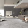 a luxurious hotel lobby with limestone effect tile Burlington Rock on the floor and Burlington Perla around the reception