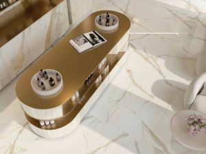 About Us 1 48×48 Calacatta Gold polished porcelain tile is an ideal choice for those seeking to infuse their interiors with the warmth and luxury