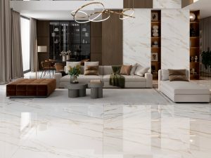picture showing a stunning living room that is both luxurious and modern with Calacatta Gold Marble look porcelain tile in extra large format