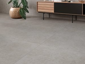 Detail picture of Sandstone Gray 48x48 tile in an open living room