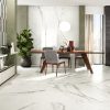 a luxurious dining room area with white Italian marble tile on the floor