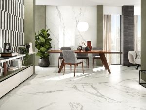 a luxurious dining room area with white Italian marble tile on the floor