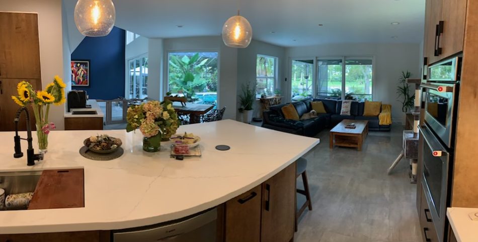 24X48 polished concrete look tile Natron Grey in an open kitchen floor