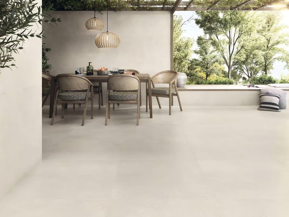Concrete Look Tiles & Beyond: Subtle Flooring Options 10 Modern and minimalist design with light beige color concrete look tile in a covered patio,