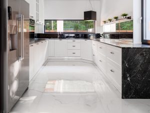 Kitchen Tile Vs Countertop 1 Modern kitchen with sleek black accents.