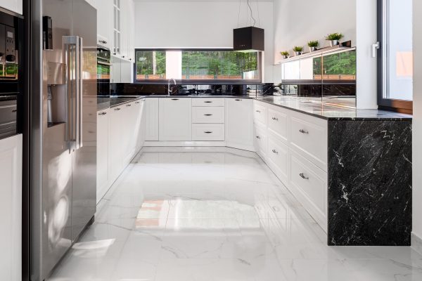 Modern kitchen with sleek black accents.