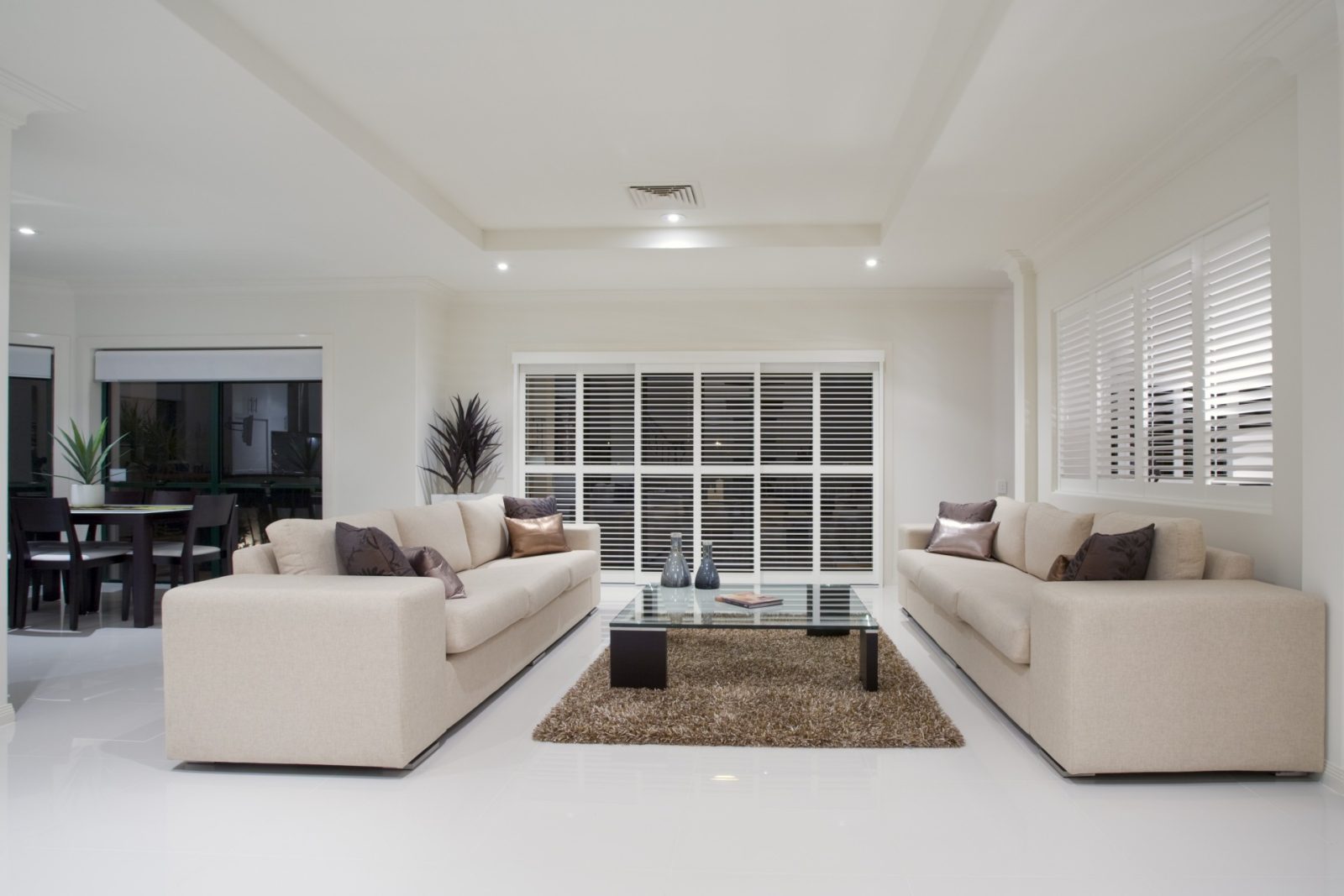 Living Room Tile Design Ideas 52 Spacious, modern, minimalist living area.