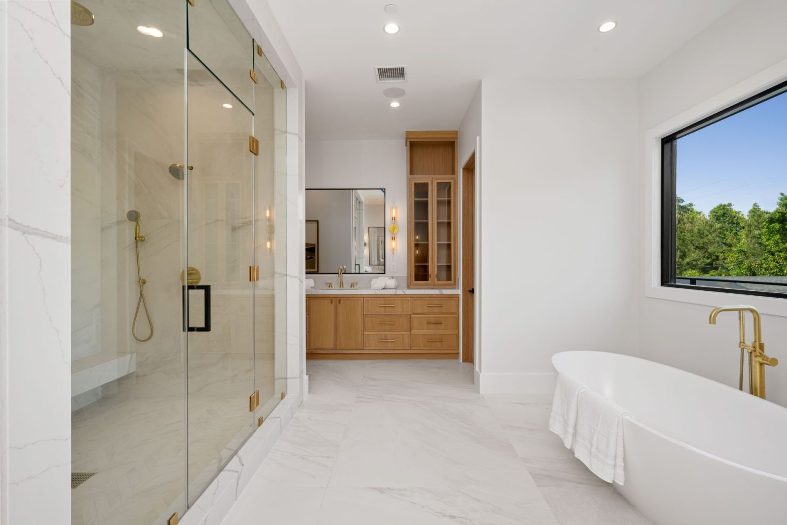 Bathroom Tile Design Ideas 55 Spacious modern bathroom with elegant fixtures.