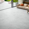 63x63 Aura Pearl limestone stone look tile extending into the patio from the Living room