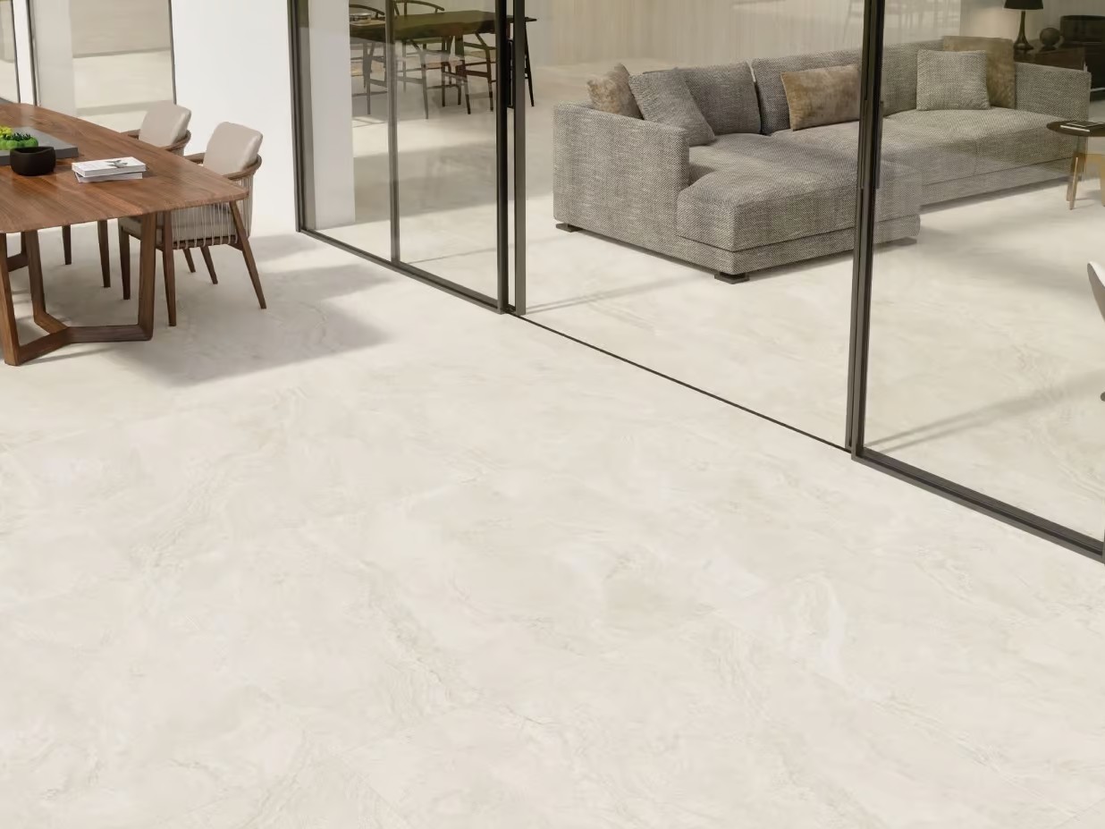 Concrete Look Tiles & Beyond: Subtle Flooring Options 13 travertine-look tile extending from the interior to the exterior