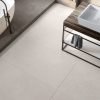 Large format 24x48 Pietra Avorio Limestone Look Tile on a modernbathroom-floor