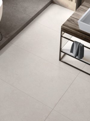Large format 24x48 Pietra Avorio Limestone Look Tile on a modernbathroom-floor