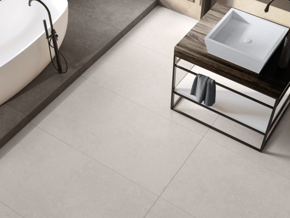 Large format 24x48 Pietra Avorio Limestone Look Tile on a modernbathroom-floor