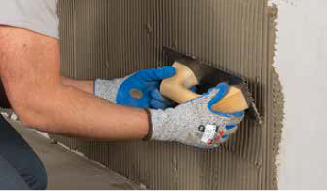 Ceramic and Porcelain Tile Installation Guide 48 apllying adhesive to the wall