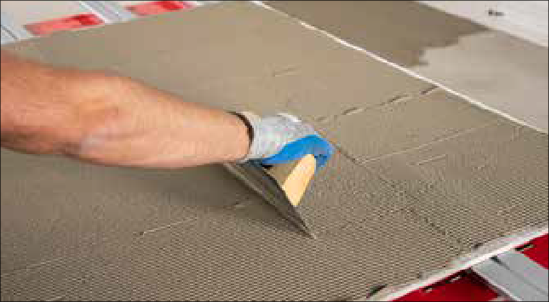 Ceramic and Porcelain Tile Installation Guide 40 applying the adhesive to the back of the tile
