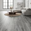 Aspen wood dark grey tile in a living room setting