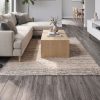 Wood look tile in Grey color with brown undertones in a modern interior