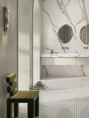 Contemporary bathroom floor featuring Intarsi Civita 24x48 large-format porcelain tiles with a traditional basketweave mosaic aesthetic.