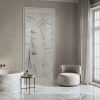 Contemporary bathroom featuring Intarsi Tiziano 24x48 large-format porcelain flooring and shower walls with a directional geometric aesthetic.