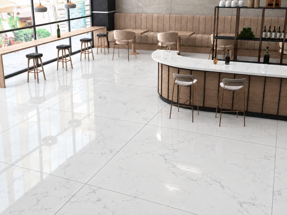 Modern café interior with polished 48x48 Statuarietto porcelain tile flooring and matching Statuarietto tile countertop, featuring subtle grey veining and a glossy white finish.