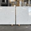 two-pieces-of-Statuarietto-48x48-Polished-porcelain-tiles-in-the-warehouse