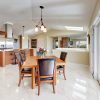Calacatta Puro polished porcelain tile installed in a kitchen and dining area