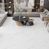 Blanco Ibiza 24×48 polished porcelain tile installed on a contemporary living room floor