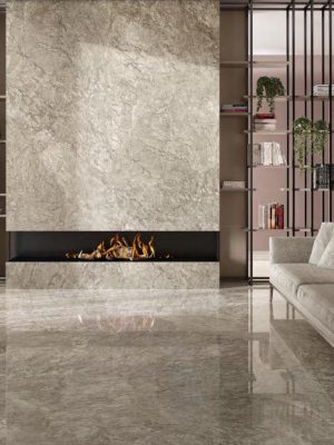 reccia Braque polished porcelain tile installed on living room floors and fireplace walls
