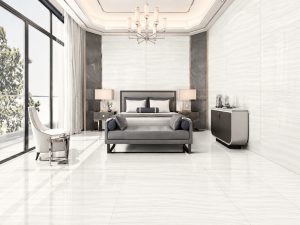 Vein cut onyx tile in a polished bedroom floor and wall installation